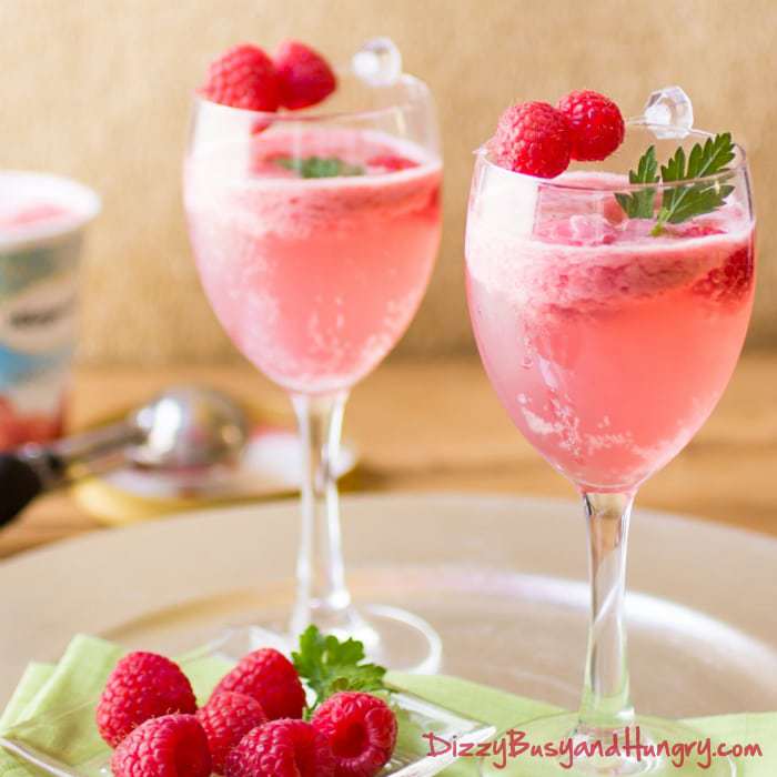 Raspberry Sorbet Wine Spritzer | DizzyBusyandHungry.com - So pretty, refreshing, and delicious! Perfect to serve for a summer evening gathering!